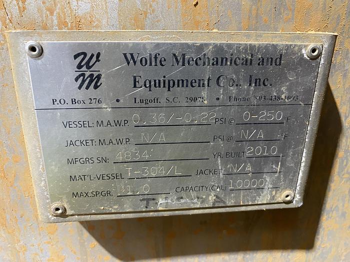 Used Used Wolfe Mechanical approximately 10,000 gallon 304L stainless steel vertical tank