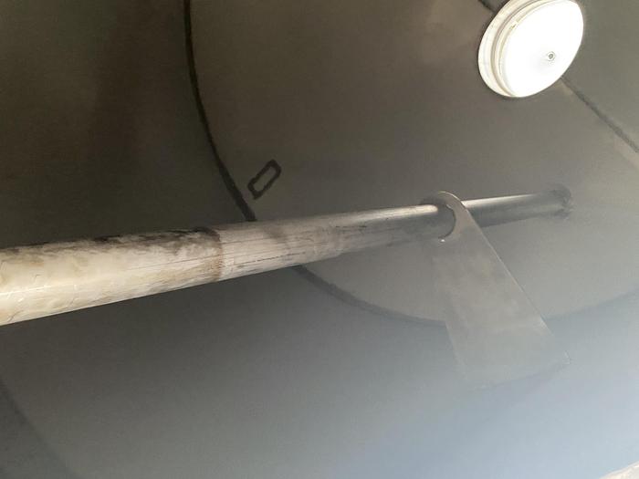 Used Used approximately 3000 gallon vertical stainless steel storage tank