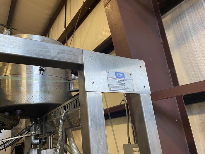 Used Used E-Pak 6 Head automatic pressure gravity filler