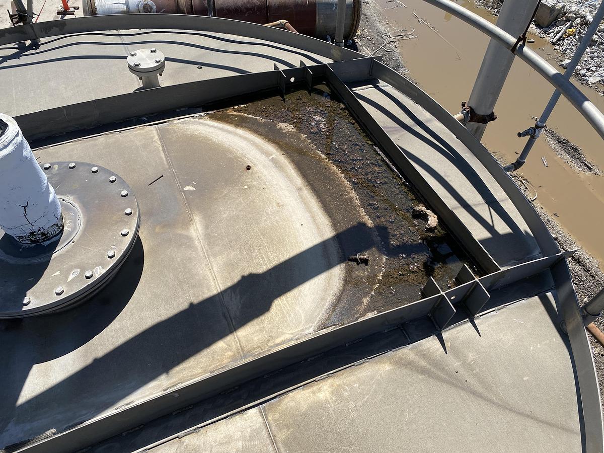 Used Used Knight Fabrication approximately 14,000 gallon stainless steel vertical tank