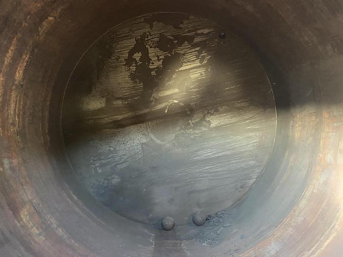 Used Used approximately 8500 gallon vertical stainless steel tank