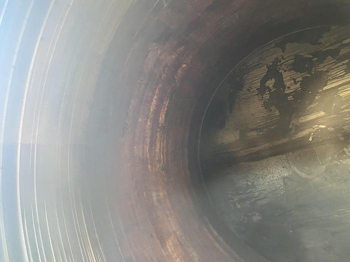 Used Used approximately 8500 gallon vertical stainless steel tank
