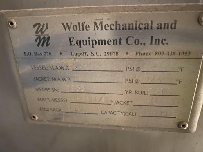 Used Used Wolfe Mechanical approximately 10,000 gallon 304L stainless steel vertical tank