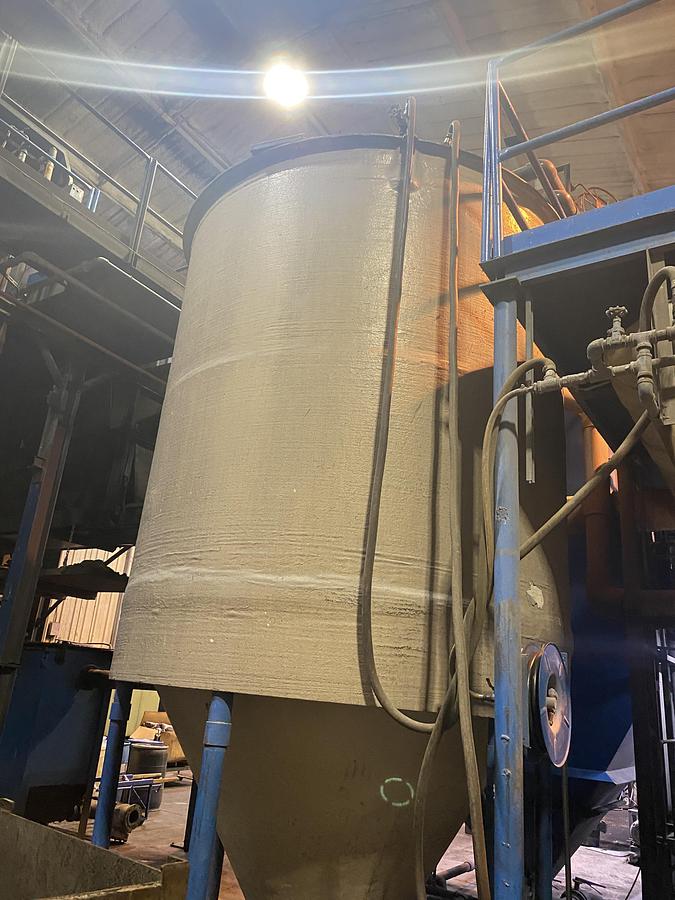 Used (2) Used approximately 3000 gallon fiberglass cone bottom tanks