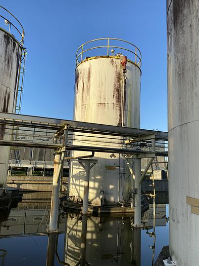 Used Used Advanced Vessel & Alloy approximately 23,800 gallon carbon steel vertical storage tank