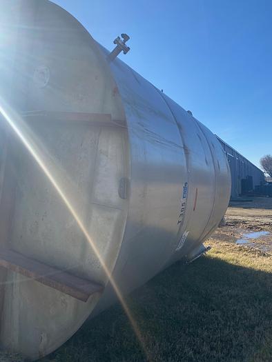 Used Used Wolfe Mechanical approximately 12,600 gallon 304L stainless steel vertical mix tank