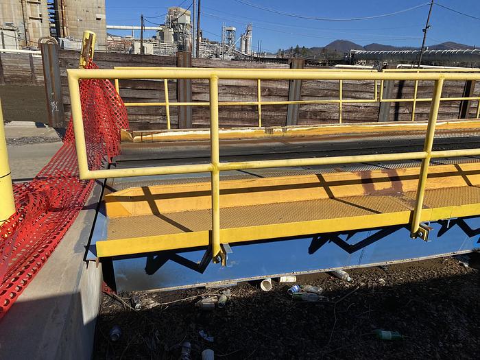 Used Used Bruks 70' Back-On Truck Dump with optimized smooth cargo flow receiving hopper