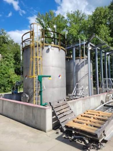 Used Used Roberts approximately 12,700 gallon vertical T304L stainless steel storage tank