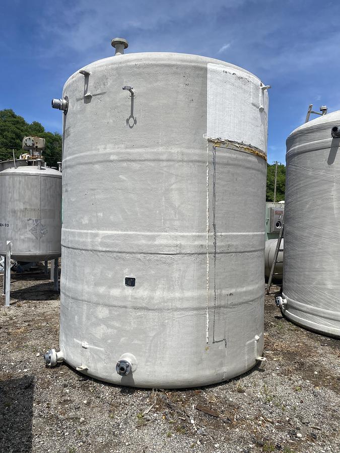 Used Used approximately 4,000 gallon vertical fiberglass storage tank.