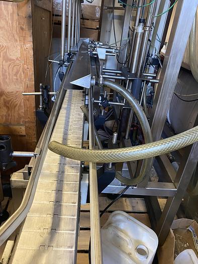 Used Used E-Pak 6 Head automatic pressure gravity filler