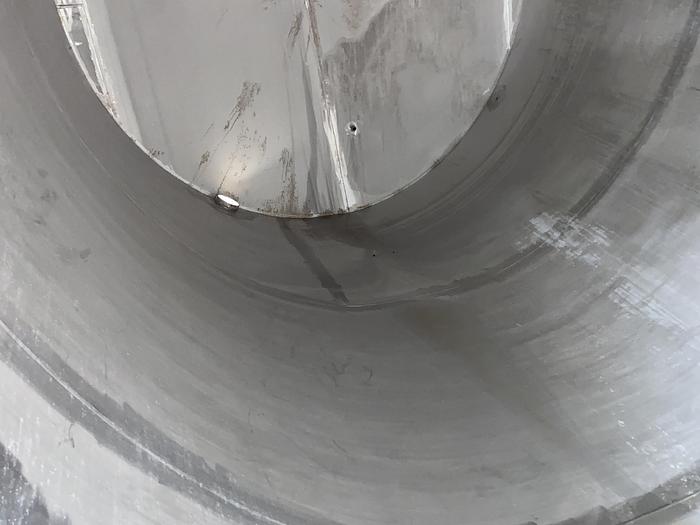 Used Used Wolfe Mechanical approximately 10,000 gallon 304L stainless steel vertical tank