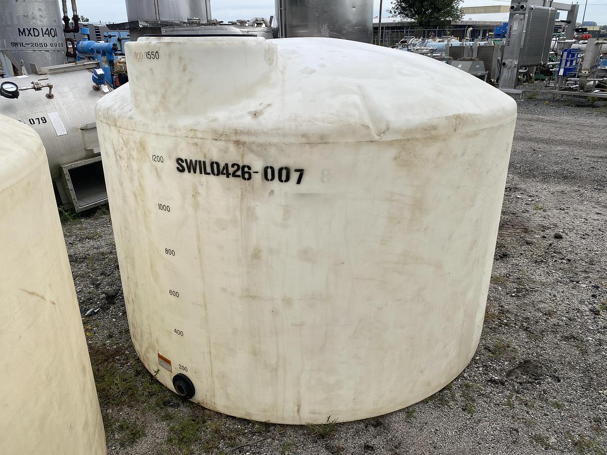 Used Used Norwesco 1550 gallon Polyethylene vertical storage tank.