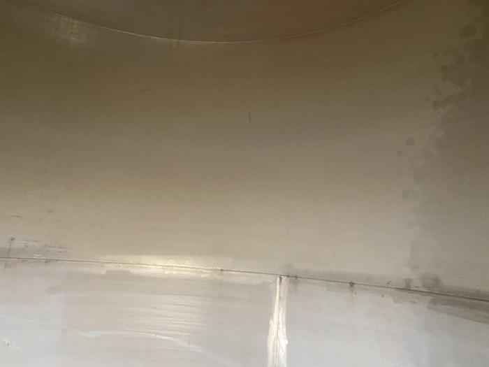 Used Used Wolfe Mechanical approximately 10,000 gallon 304L stainless steel vertical tank