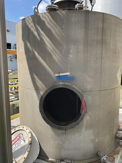 Used Used approximately 3000 gallon vertical stainless steel storage tank