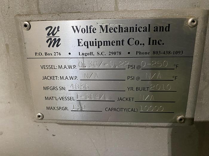 Used Used Wolfe Mechanical approximately 10,000 gallon 304L stainless steel vertical tank