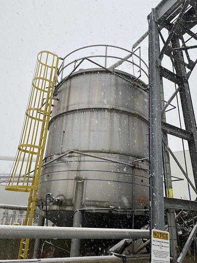Used Used Knight Fabrication approximately 14,000 gallon stainless steel vertical tank