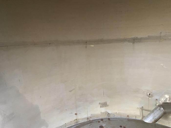 Used Used Wolfe Mechanical approximately 10,000 gallon 304L stainless steel vertical tank