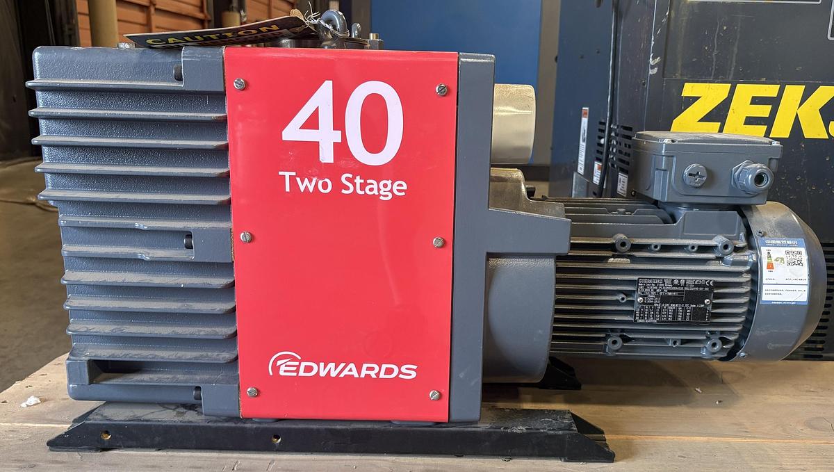 Unused Edwards model E2M40 2 stage oil-seal rotary vane mechanical vacuum pump.