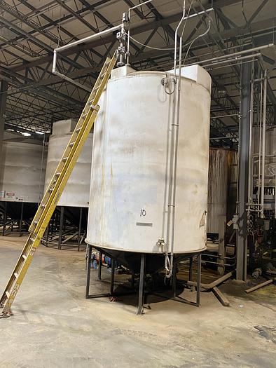Used Used Assmann approximately 4200 gallon cone bottom poly tank