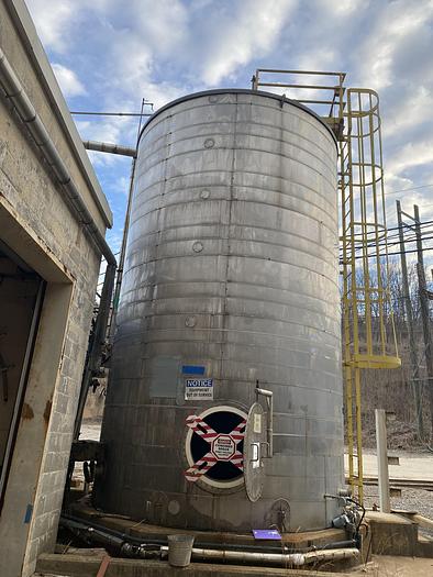 Used Used approximately 16,000 gallon 304 stainless steel vertical tank