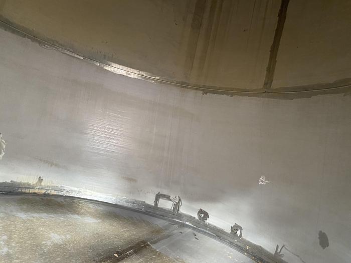 Used Used Wolfe Mechanical approximately 10,000 gallon 304L stainless steel vertical tank