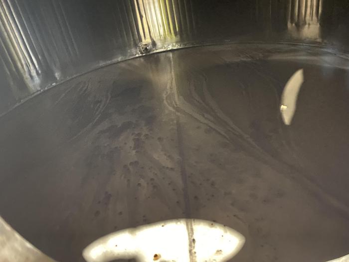 Used Used Walker 12,000 gallon 304 stainless steel vertical jacketed silo