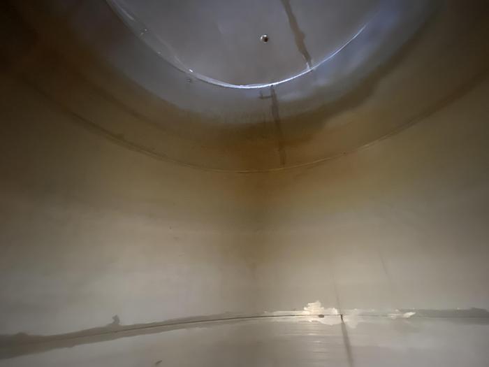 Used Used Wolfe Mechanical approximately 10,000 gallon 304L stainless steel vertical tank