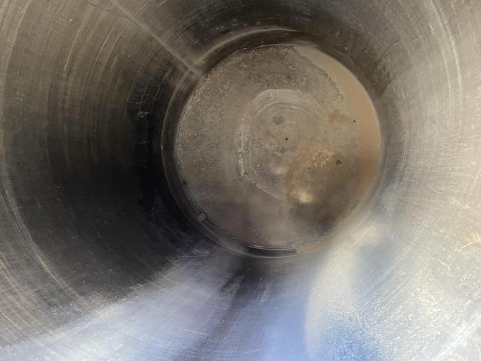 Used Used approximately 1500 gallon vertical stainless steel tank