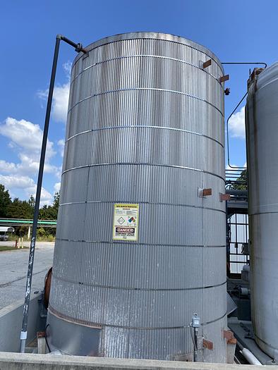 Used Used approximately 9000 gallon carbon steel vertical storage tank