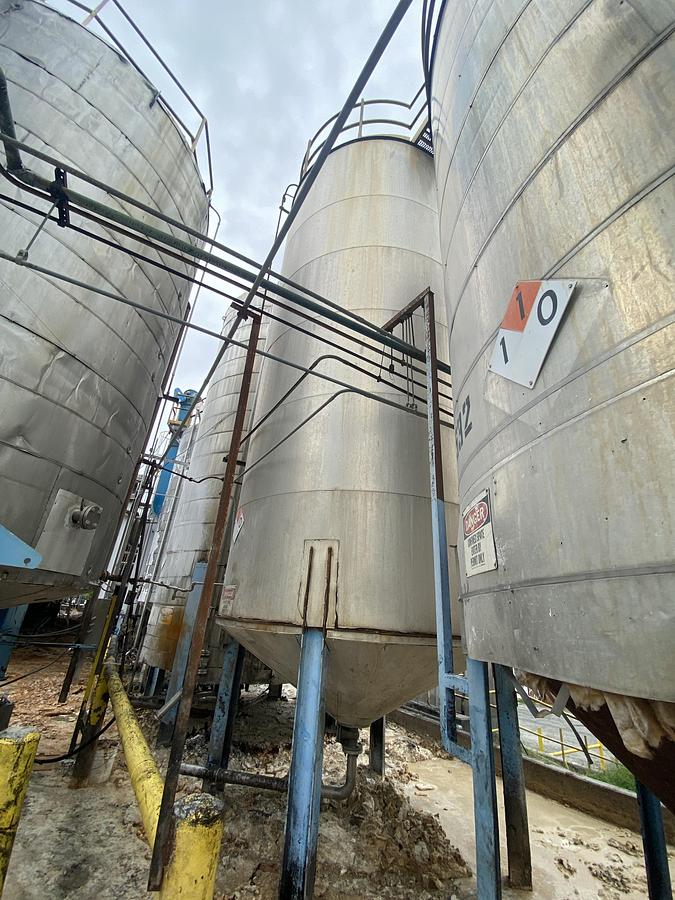 Used Used Industrial Air Inc. approximately 10,000 gallon stainless steel agitated storage tank with internal coils