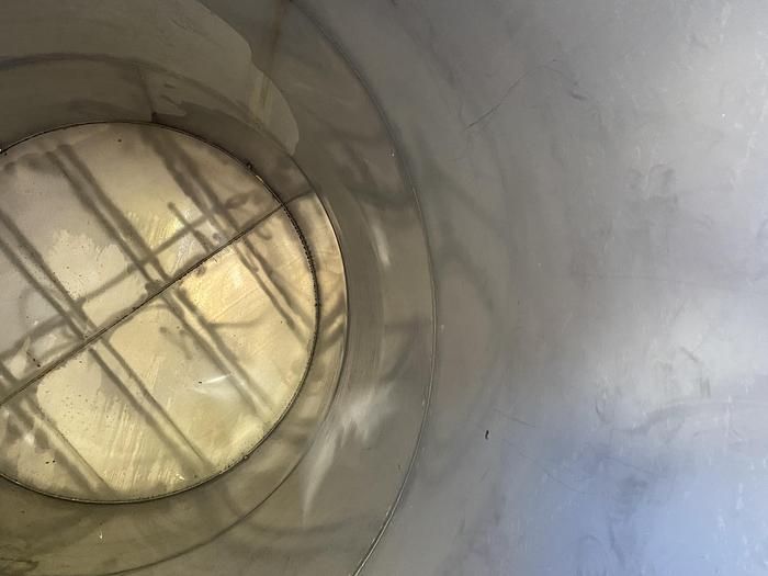 Used Used FESCO approximately 3500 gallon 304 stainless steel vertical storage tank.