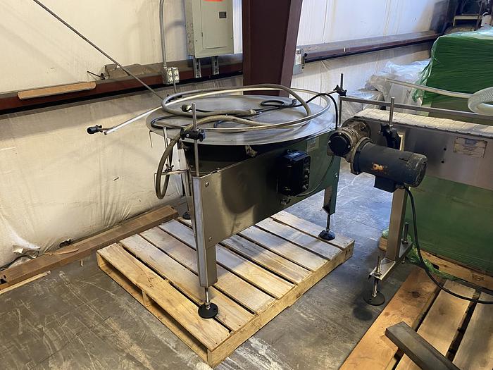 Used Used E-Pak 6 Head automatic pressure gravity filler