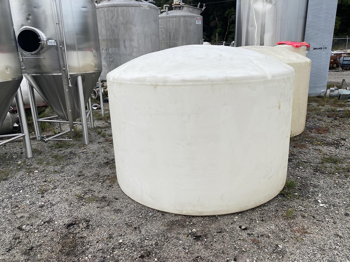 Used Used Norwesco 1550 gallon Polyethylene vertical storage tank.