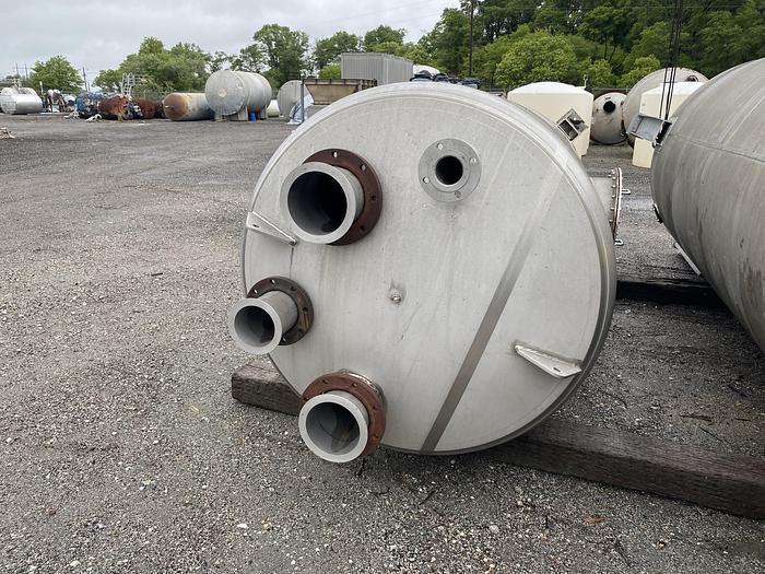 Unused Crown Iron Works Inc. approximately 1300 gallon 304 stainless steel vertical tank