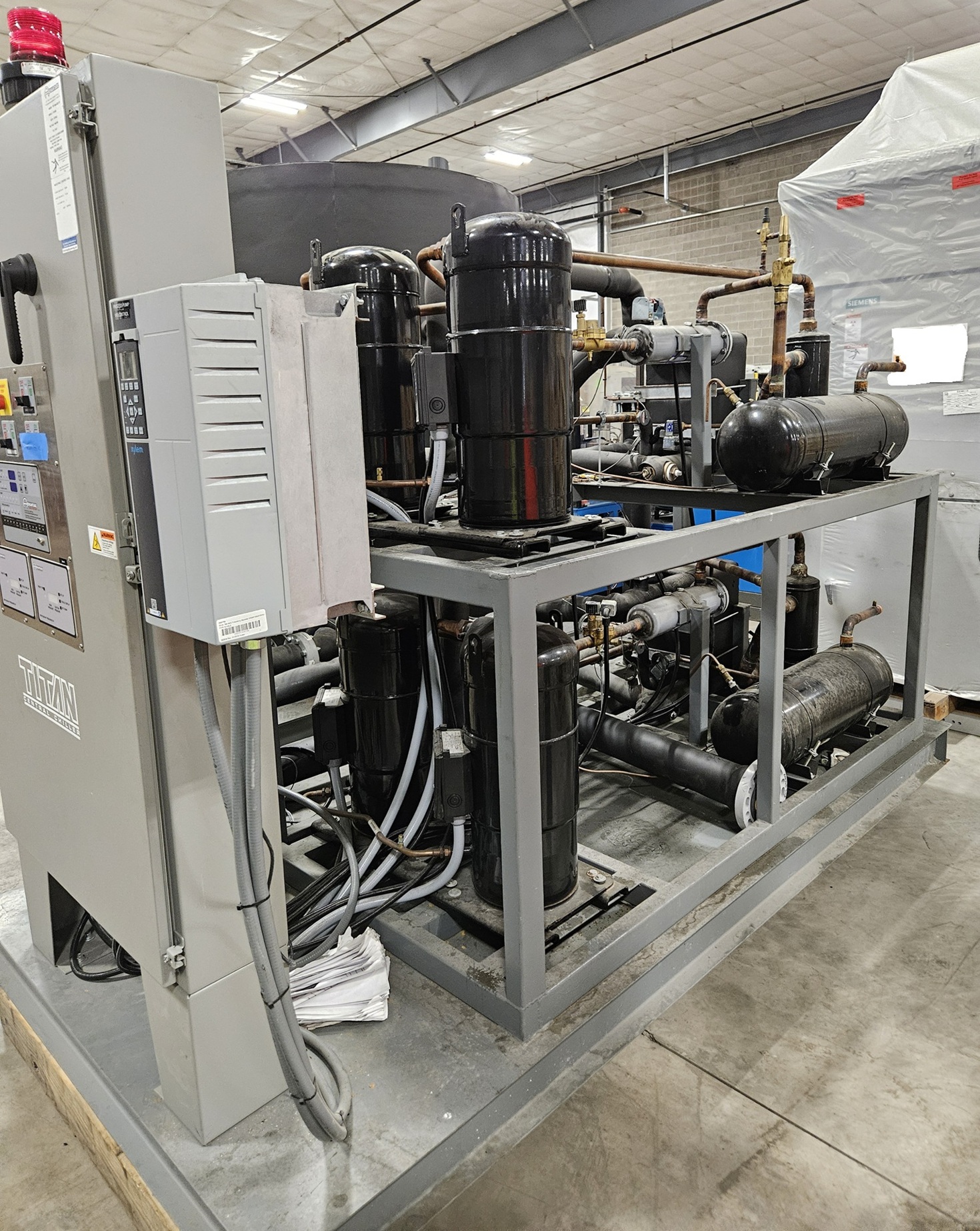 Used Used 93-Ton Air Cooled Advantage Titan Central Chiller with Remote Outdoor Condensers (2023) Model: TIP-100A-MZC-3P