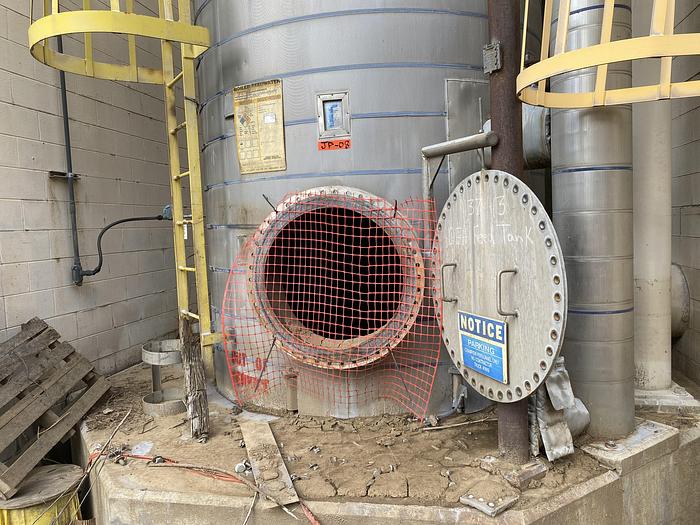 Used Used Armor Metalworks approximately 10,500 gallon 304L stainless steel vertical tank