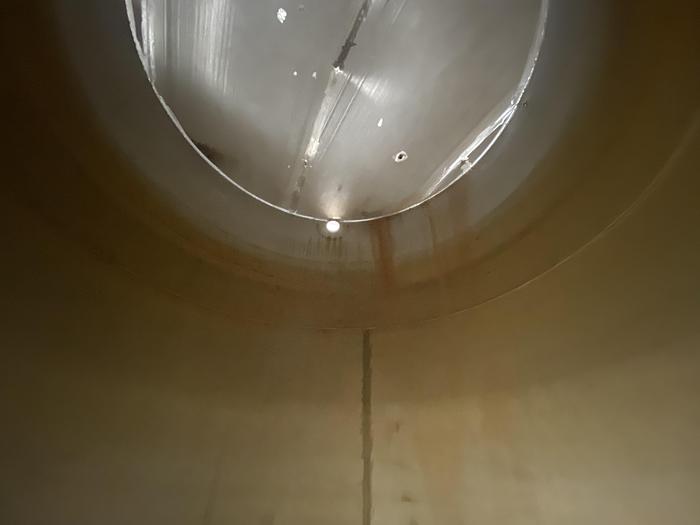 Used Used Wolfe Mechanical approximately 10,000 gallon 304L stainless steel vertical tank