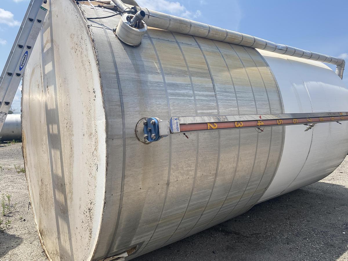 Used Used Highland Tank approximately 9500 gallon vertical carbon steel condensate tank.