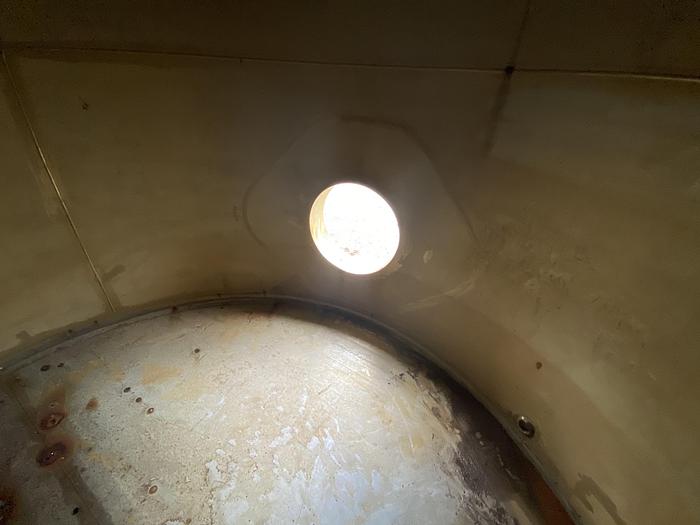 Used Used Wolfe Mechanical approximately 10,000 gallon 304L stainless steel vertical tank