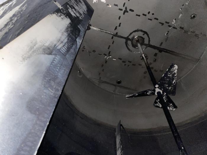 Used Used Wolfe Mechanical approximately 12,600 gallon 304L stainless steel vertical mix tank