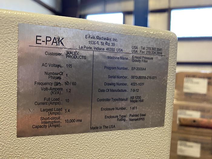 Used Used E-Pak 6 Head automatic pressure gravity filler