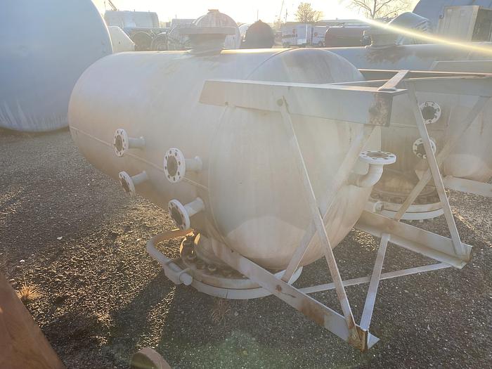 Used Unused Merrill Fabricators Inc. approximately 650 gallon vertical carbon steel pressure tank.