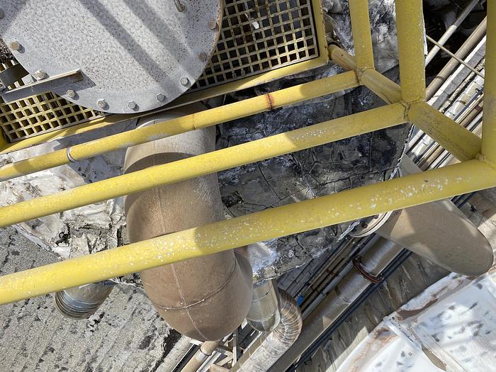 Used Used Armor Metalworks approximately 10,500 gallon 304L stainless steel vertical tank