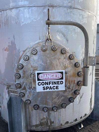 Used Used CMW Inc approximately 4000 gallon stainless steel vertical storage tank