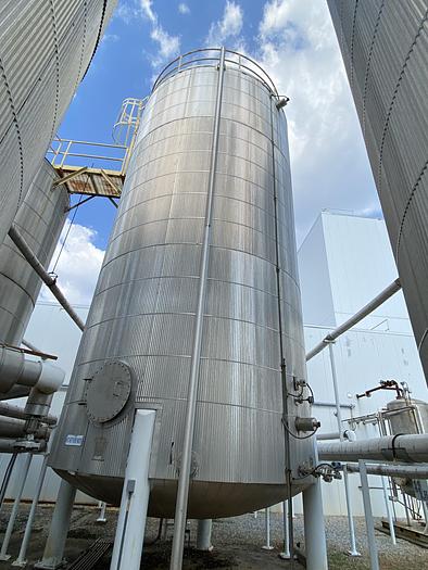 Used Used Bendel approximately 39,700 gallon 304 stainless steel vertical storage tank.