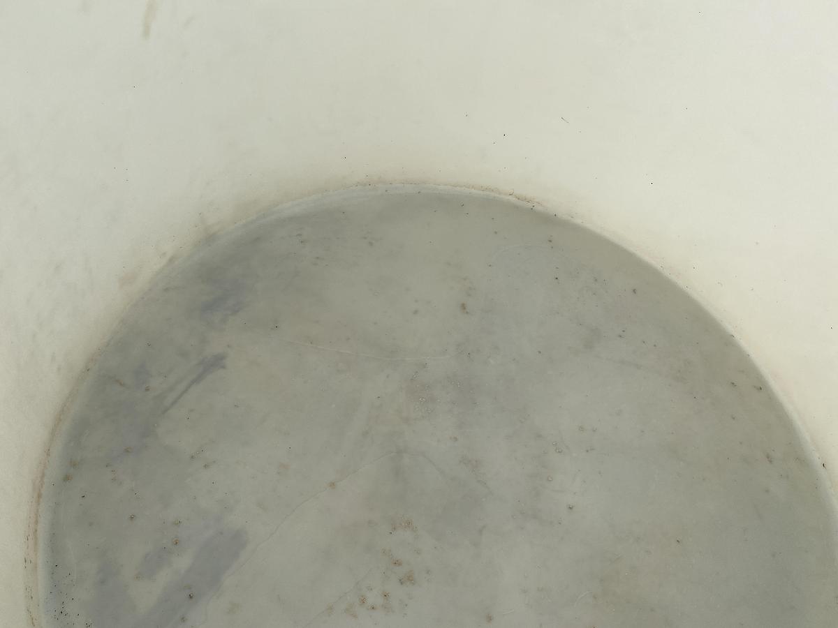 Used Used Norwesco 1550 gallon Polyethylene vertical storage tank.