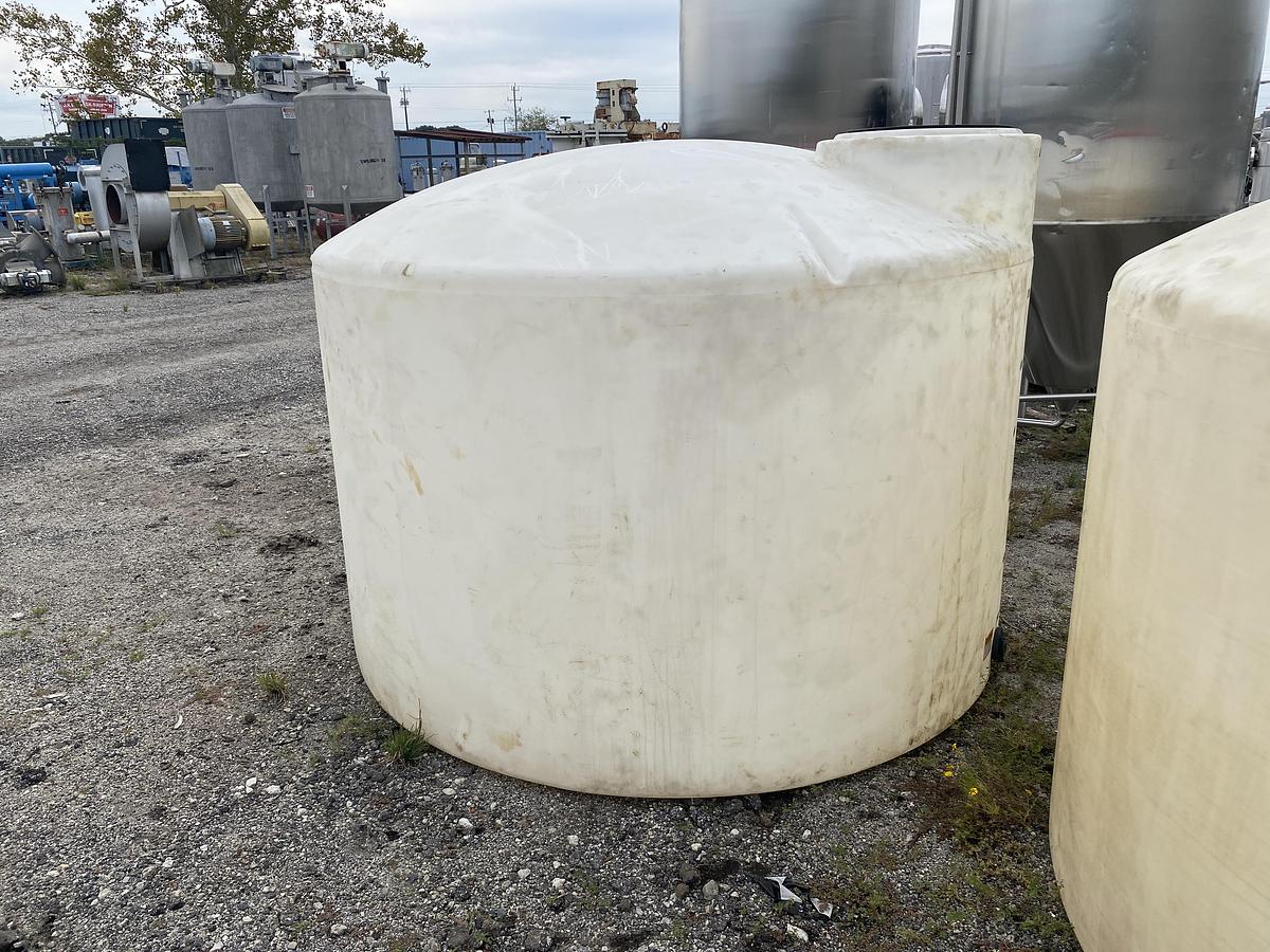 Used Used Norwesco 1550 gallon Polyethylene vertical storage tank.