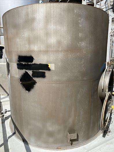 Used Used approximately 3000 gallon vertical stainless steel storage tank