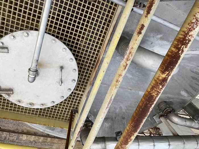 Used Used approximately 16,000 gallon 304 stainless steel vertical tank