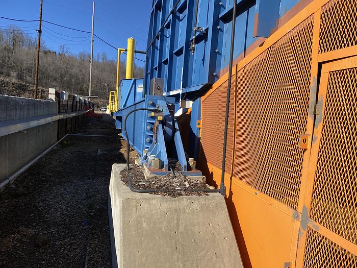 Used Used Bruks 70' Back-On Truck Dump with optimized smooth cargo flow receiving hopper